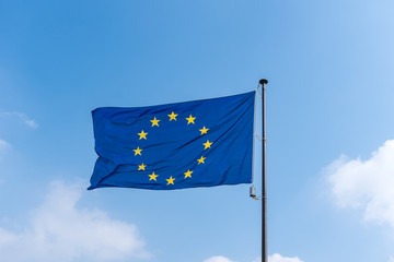 Flag of  European Union against blue sky