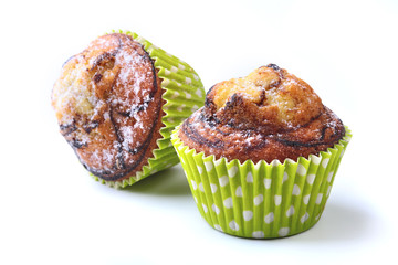 Assorted with Delicious homemade cupcakes with raisins and chocolate isolated on white background. Muffins. Top view. Copy space.