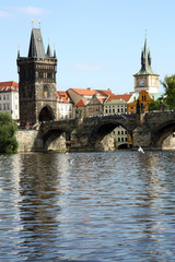 Fototapeta na wymiar Old bridge in prague, with river