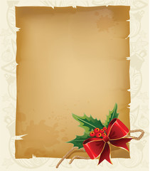Old parchment paper with christmas bow