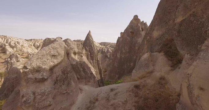 Amazing and unusual rocks of the Cappadocia. Impressive valleys: Love, Zemi, Rose, Kidar. Natural stone pillars of various shapes.