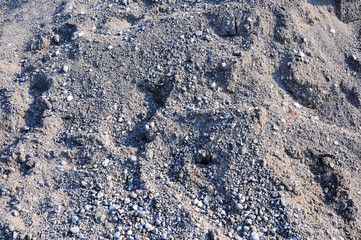 Surface of pebbles and gravel for texture or background.