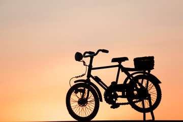 Fototapeta premium bicycle silhouette on sweet sky and shadow