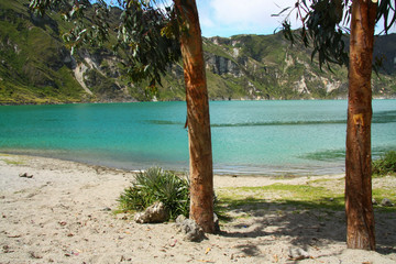 The Quilotoa volcanic lake, clear blue water. Ecuador