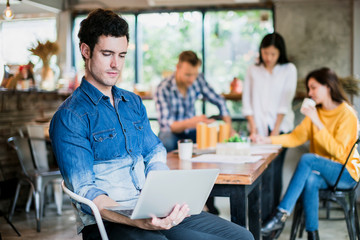 smart attractive caucasian man portrait with confident and happiness in cafe startup fouder ideas concept