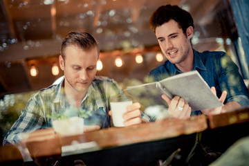 creativity brainstorm ideas concept with business partnet meeting workshop in coffeeshop and reflect of garden on window