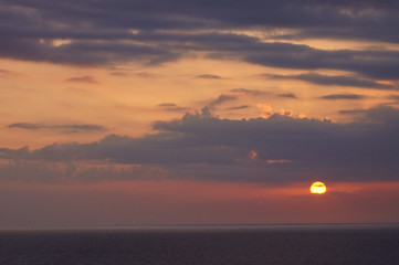 Naklejka na ściany i meble sunrise above the sea