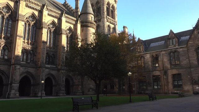Tilt up from within a quadrangle of Glasgow University to reveal the Tower.
