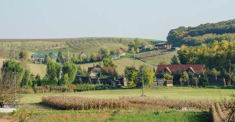 Fototapeta premium Traditional European buildings in the autumn hills