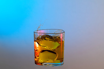 alcohol liquor whisky cause of accident splash in clear glass night life party drink don't drive