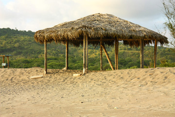 Small shelter on a beach in Ecuador.