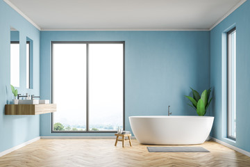 Fototapeta na wymiar Loft blue bathroom interior, tub and sink