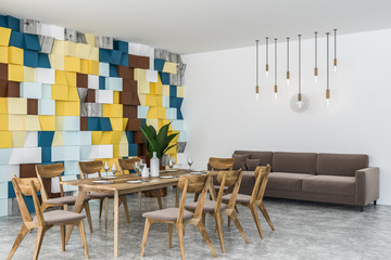 Colorful dining room corner with sofa