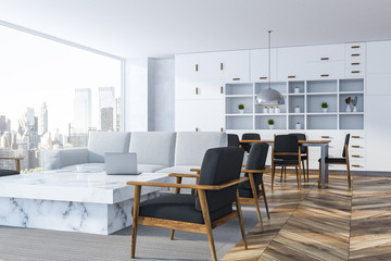 White living room corner, marble table