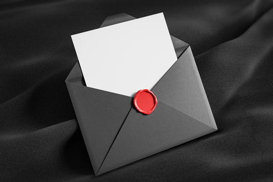 Open Gray Envelope On Black Tissue