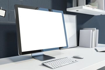 Mock up computer screen in gray office