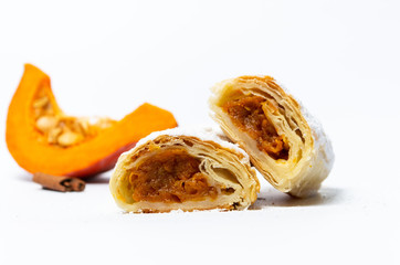 Homemade Pumpkin pie with sugar on white