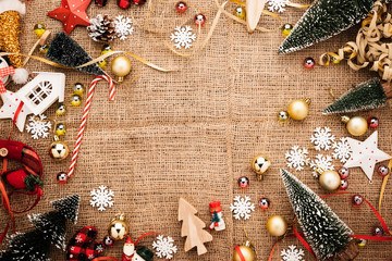 festive celebration background with christmas decorating items on old vintage rattan floor with free copy space