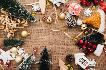 Fototapeta na wymiar festive celebration background with christmas decorating items on old vintage rattan floor with free copy space