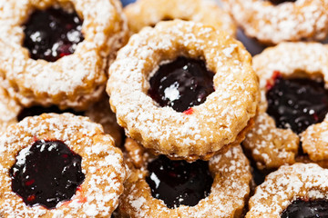 Raspberry Jam Filled Shortbread Butter Cookies. Selective focus.