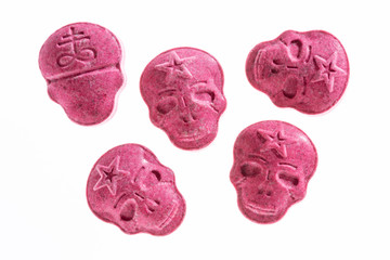 Red Army Skull, Ecstasy, XTC pills isolated on a white background.