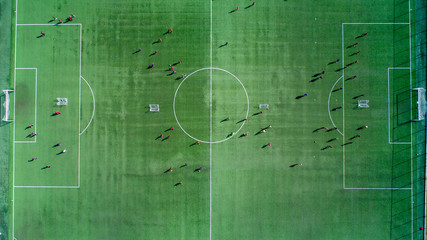 Aerial view of a soccer , football match. Football field and Footballers 