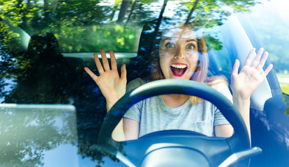 Young woman in a self-driving autonomous electric car