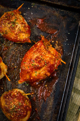Stuffed Calamari Squid Tubes with Tomato Sauce. Selective focus.