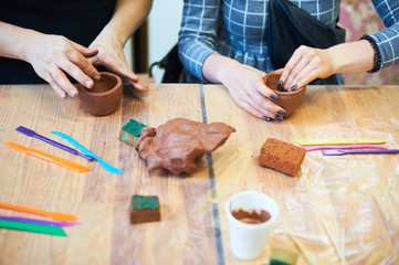 Obraz na płótnie Canvas tools for pottery on the table