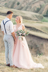 wedding couple on the nature in summer day.