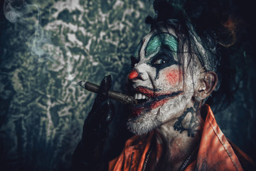 clown smoking cigar