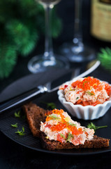 Salmon pate  with red caviar served with sliced bread