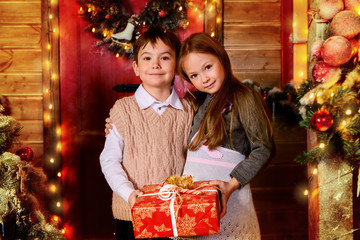 children with shristmas presents