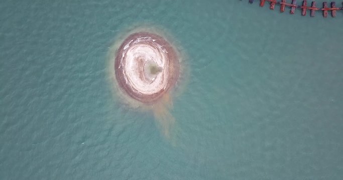 A sand pit after sucking  of  a private 's  company sand extraction in the the gulf of Thailand near the Chang Island in Trad province since the company gets  a concession from the government.