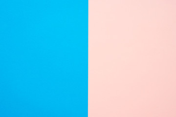 Fototapeta premium Two tone pink blue color paper background with copy space