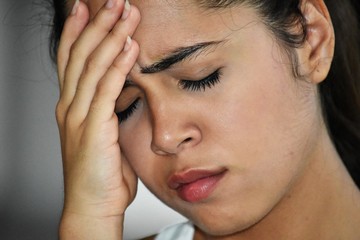 Female With Headache