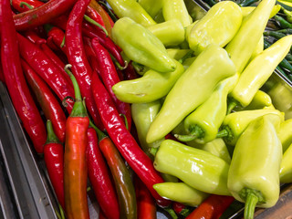 Red and green bell pepper in supermarket.