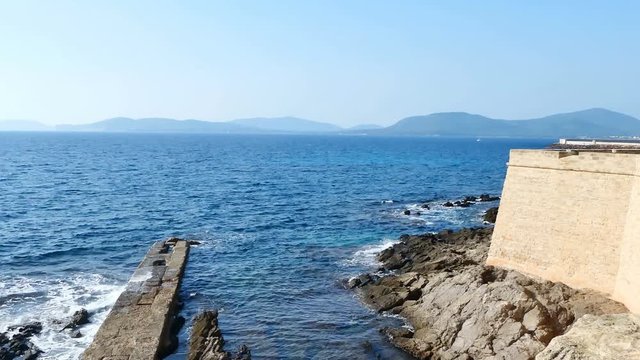 Panoramic view of Alghero seafront on a clear day. Sardinia, Italy