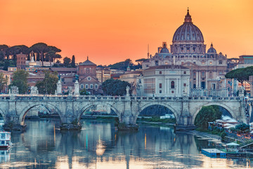 Fototapeta na wymiar St. Peter's Basilica in Rome, Italy, at sunset. Scenic travel background. Scenic travel background.
