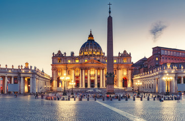 St. Peter's Basilica in Rome, Italy, at sunset. Stylized travel and architectural background.