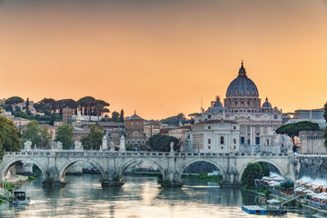 St. Peter's Basilica in Rome, Italy, at sunset. Scenic travel background.. - obrazy, fototapety, plakaty