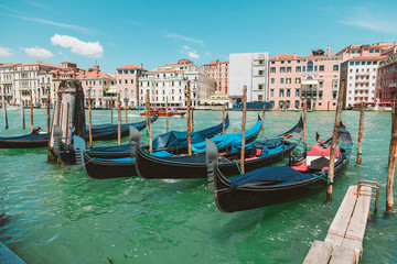 Fototapeta na wymiar A line on venetian gondolas 