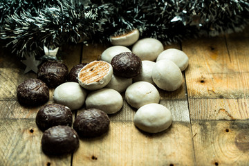 Fototapeta na wymiar christmas sweet, chocolate gingerbreads on wooden background