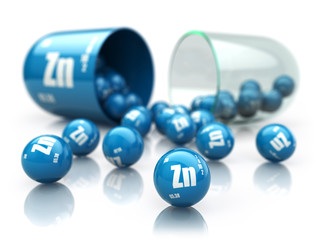 Capsule with zinc Zn element.  Dietary supplements. Vitamin capsule isolated on white.