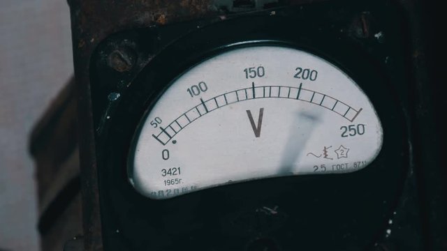 Old vintage voltmeter that shows voltage