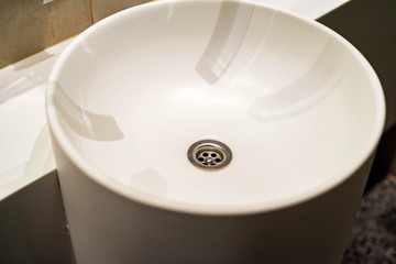 White round sink in a modern bathroom