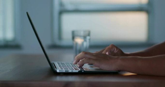 Work on laptop computer at home