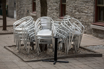 Fototapeta na wymiar Aluminium chairs piled