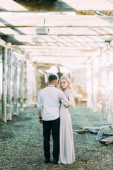 Wedding in European style on the farm. Old abandoned building. Fine art in the style of processing.