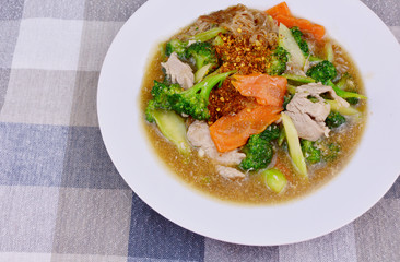 pork and Broccoli and carrot in thick gravy with thin rice noodles